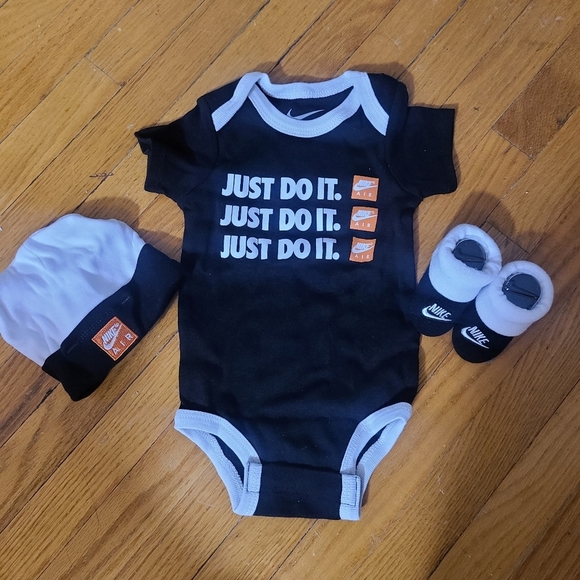 Nike® Size 0-6M 3-Piece Swoosh Bodysuit, Hat and Booties Set  - Picture 1 of 4